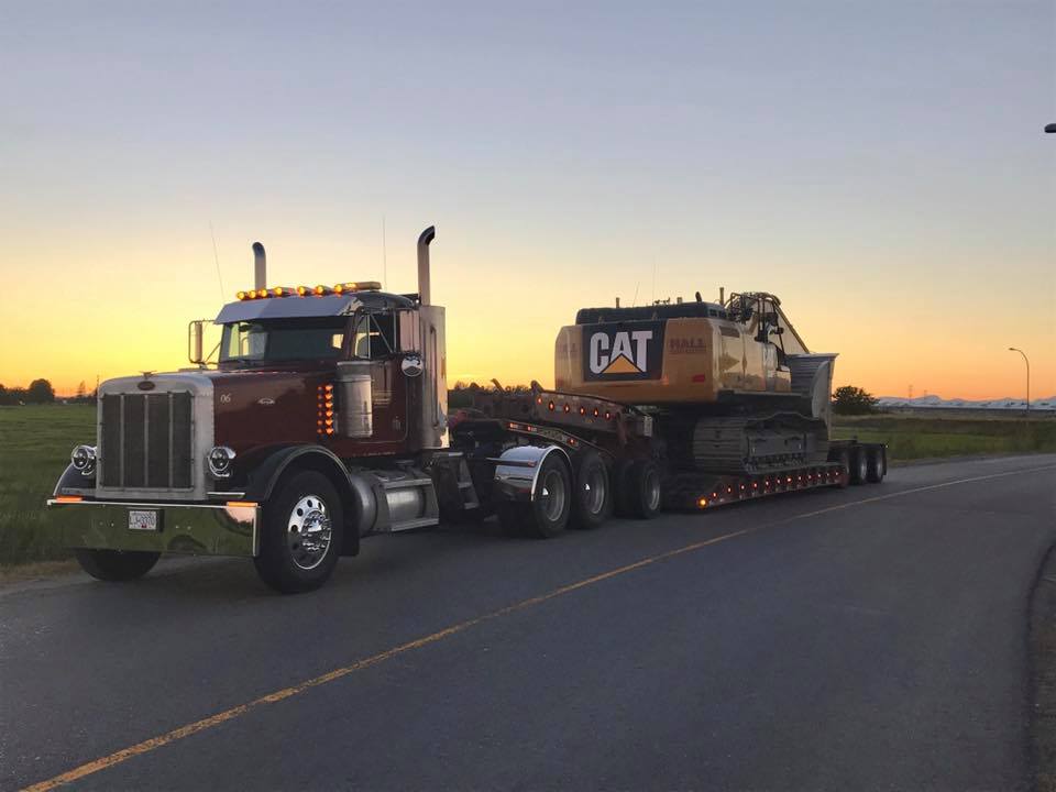 Truck06 Hauling A Cat 336 Excavator In Delta